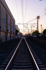 Fototapeta premium Caltrain Railroad in San Mateo at Sunset
