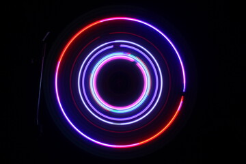 Music Dj concept. Trail of fire and smoke on vinyl record. Burning vinyl disk. Turntable vinyl record play Selective focus