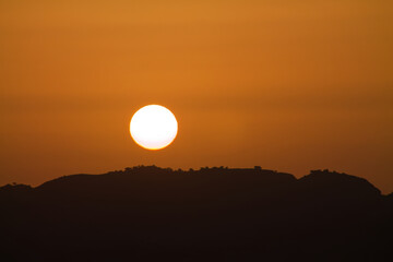 Tranquil Sunset Over Hills
