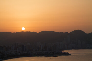 Serene Sunset Over Coastal City