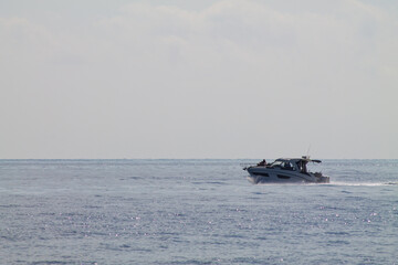 Motorboat Cruising on Calm Ocean Waters