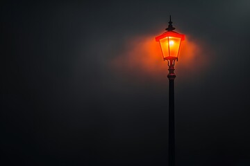 Street lamp on pole, black background, foggy night, orange light from top, minimalist style, low angle, wide-angle lens, shallow depth of field, dark cinematic mood.