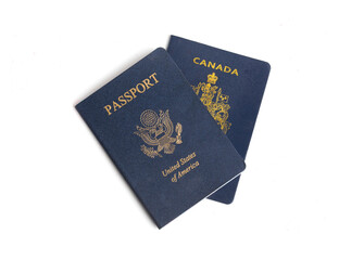 US and Canadian passport on white background