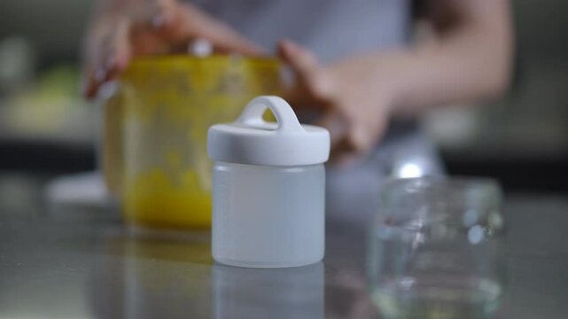 Closeup of a stylish storage container on a modern kitchen countertop, showcasing its sophisticated design