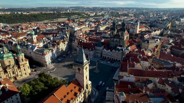 Beautiful Aerial footage of Old town Square, the Astronomical Clock, St. Nicholas Church and the Church of Our Lady before T&yacute;n yn Prague