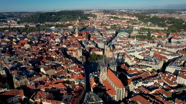 Beautiful Aerial footage of Old town Square, the Astronomical Clock, St. Nicholas Church and the Church of Our Lady before T&yacute;n yn Prague