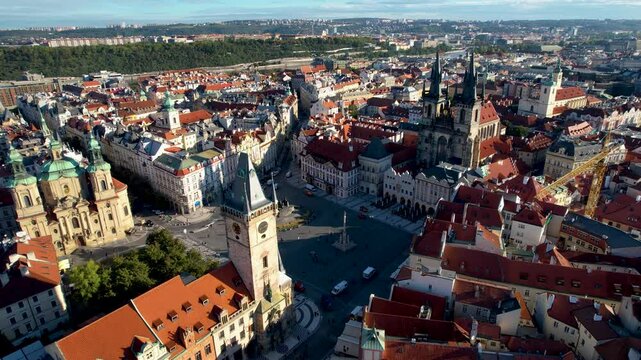 Beautiful Aerial footage of Old town Square, the Astronomical Clock, St. Nicholas Church and the Church of Our Lady before T&yacute;n yn Prague