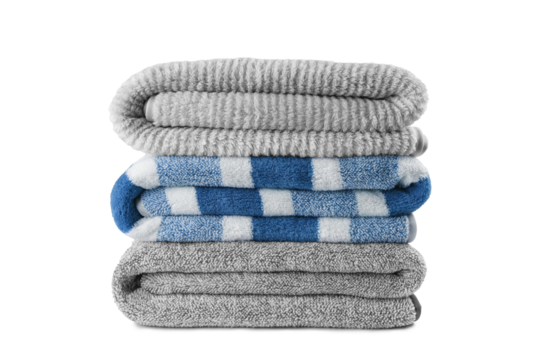 Soft fluffy striped grey and blue bath towels folded in stack isolated on white, transparent background. Terry cloth, striped pattern towel texture, cotton textile microfiber beach towel material