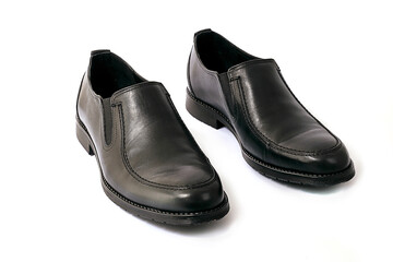 black leather shoes on a white background