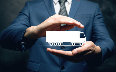 Man taps virtual screen. Truck icon on screen