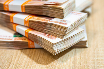 packs of Russian 5000 ruble bills, selective focus and close-up