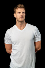 Obraz premium Blonde Caucasian Man Posing in Casual White T-Shirt and Blue Jeans
