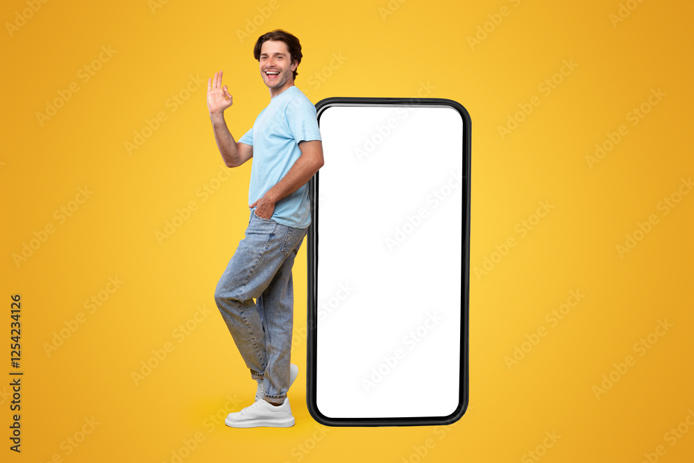 Aufkleber cool mobile offer. profile of happy casual guy leaning on huge cellphone with empty white screen, sh