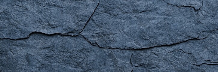 Fototapeta premium Blue gray stone texture. Toned rough rock surface. Close-up. Grunge background with copy space for design. Wide banner.