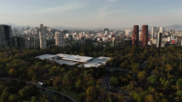 Drone flies over Chapultepec Park in Mexico City and approaches the National Museum of Anthropology