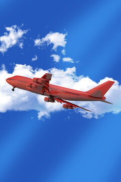 Red Plane Soaring in a Clear Blue Sky with White Clouds