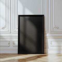 A large black poster stands on the parquet floor in an empty white room with classical Greekstyle walls The poster is made of a matte wooden frame in an A4 form