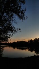 Fototapeta premium sunset over the river