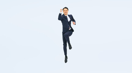 Obraz premium ジャンプするミドル男性ビジネスパーソンの全身写真（切り抜き背景透過PNGも販売しております。作成者リンクから「PNG」で検索してください）