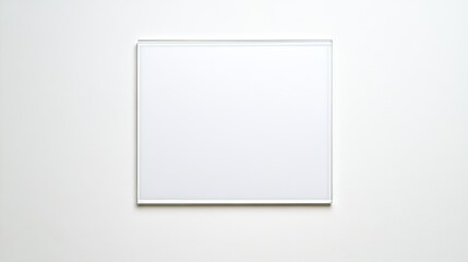Minimalist blank frame on a white wall, ideal for showcasing artwork or photography