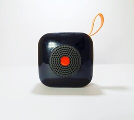 Black Mini Portable Hanging Speaker In The White Background