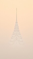 Fototapeta premium Majestic Temple Spire Emerging Through Misty Morning Haze Against Soft Peach Sky in Serene Minimalist Composition
