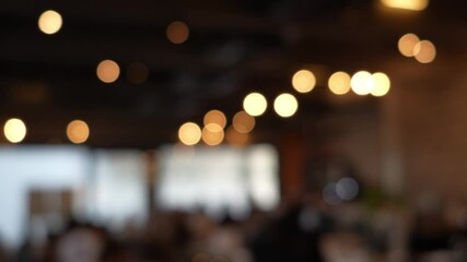 Blurred coffee shop situation, with background of people or crowd relaxing and enjoying coffee