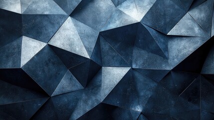 Abstract geometric background featuring dark blue and gray triangular shapes with texture