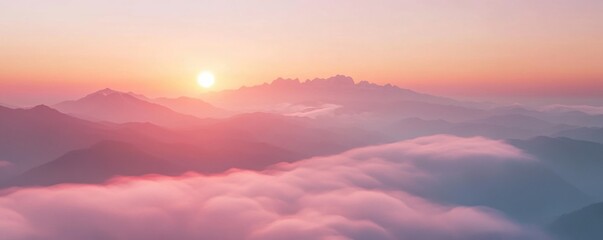 Fototapeta premium Sunrise Over Misty Mountains: A Serene Panorama