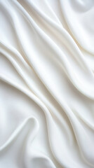 Naklejka premium Soft white fabric with elegant folds and smooth texture
