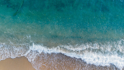 Aerial view of beautiful tropical beach with turquoise water and white sand