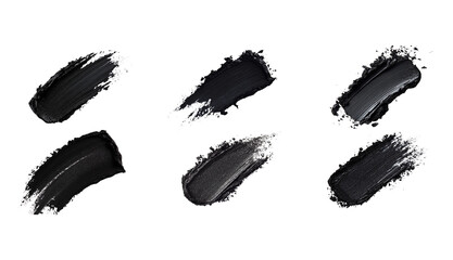 Black eyeshadow smudges on a white background