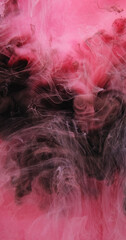 Mist swirl. Paint splash water. Defocused pink color dye haze texture cloud floating wave on dark black abstract art background.