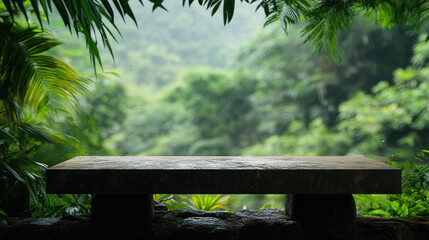 Naklejka premium pristine minimalist stone table framed by vibrant greenery in serene natural setting. lush background creates tranquil atmosphere, perfect for relaxation