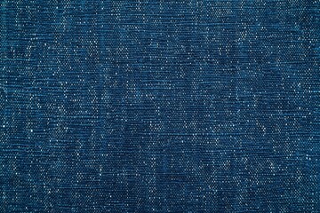Deep Indigo Texture: A rich, deep indigo textile background with subtle texture and variations in tone.  Perfect for adding depth and sophistication to your design projects. 