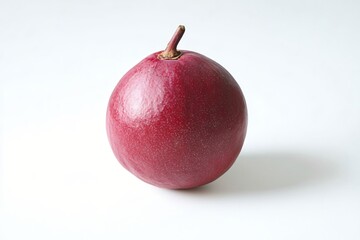 Fototapeta premium Exotic maroon passion fruit on a white background showing vibrant color and fresh texture