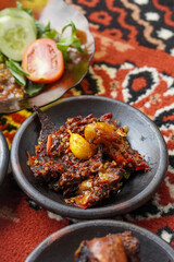 Indonesian cuisine rich in spices, captured on February 10, 2025. The vibrant colors and aromatic ingredients create a flavorful and authentic culinary experience