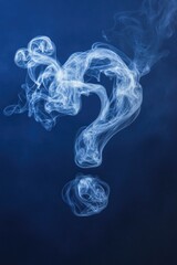 Fototapeta premium Mysterious smoke forms question mark against deep blue backgroun