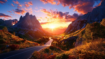 Fototapeta premium Majestic Mountain Road at Sunset with Vibrant Sky and Golden Light Illuminating the Landscape