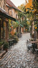 Fototapeta premium Charming Cobblestone Lane with Fall Foliage and Rustic Decor