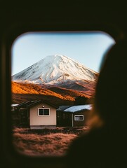 A photo of Mount Fuji taken from the window inside an old train in Japan, with a vintage vibe and film photography style