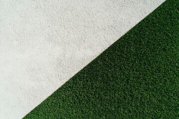 Concrete and artificial turf divide for landscape design or texture background