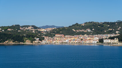 Fototapeta premium San Terenzo, Italy. Amazing view of the village of San Terenzo from the boat. It's a village part of The Poets' Gulf. Best of Italy