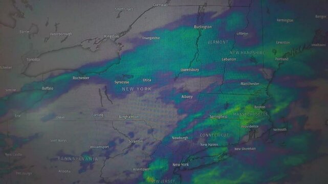 Animated weather map showing precipitation across New York, Vermont, New Hampshire, Massachusetts, and Connecticut.