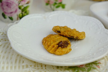Popular cookies in Malaysia during celebration of Eid Mubarak (Hari Raya) on white isolated background called coffee and chips