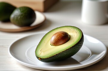 Ripe avocado on a white plate, placed on a rustic wooden table, healthy eating concept