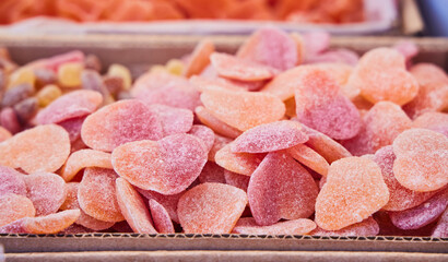 Dessert is marshmallows or marmalade with sugar. Bright colors, assortment