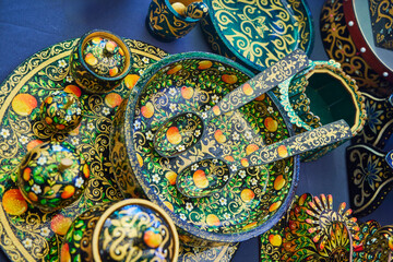 Folk art, traditional Slavic dishes made of wood. Painting with paints