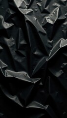 Obraz premium Distressed plastic sheeting, uneven folds, stark black contrast, folds, rough, distressed