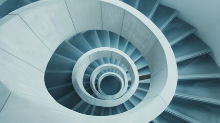 Fototapeta premium Top view of a modern spiral staircase with smooth curves and stylish design.